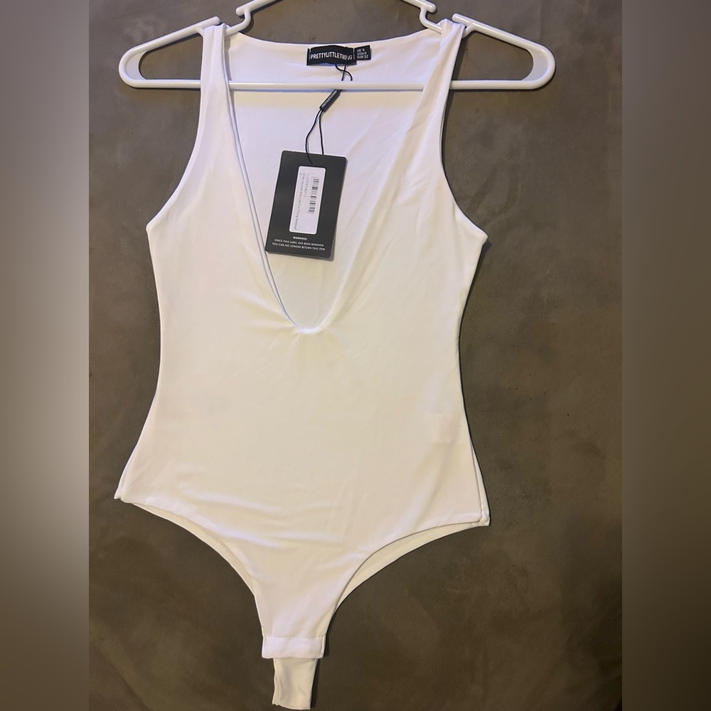 PrettyLittleThing Cream Sleeveless Fitted Bodysuit